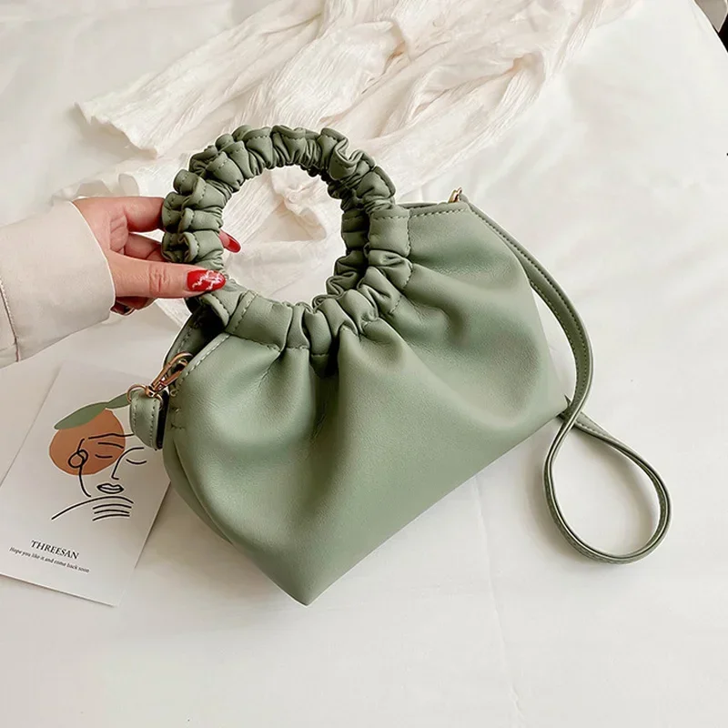 Małe torebki damskie z plisowa – Key Holder Leather Pouch recenzja i cena