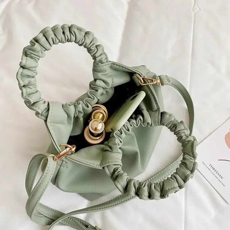 Małe torebki damskie z plisowa – Key Holder Leather Pouch recenzja i cena